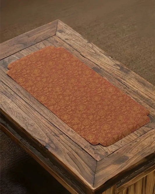 Brown lotus mat matches well with the wooden table, and can be for incense or tea time