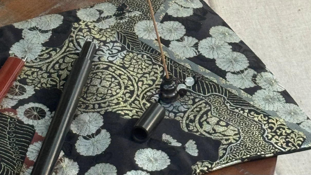 bifang studio shows our scent ritual on a black floral-patterned fabric which is one product for living decor