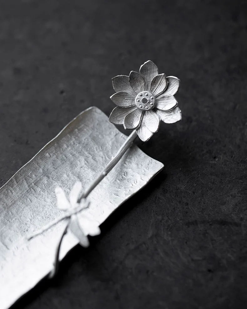 detail of handcrafted lotus incense holder, delicately shaped with layered petals, perfect for meditation and Feng Shui rituals.