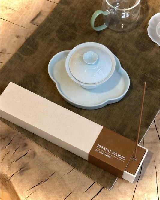 Earth Element Chinese Feng Shui incense for grounded scentscaping with traditional tea ware