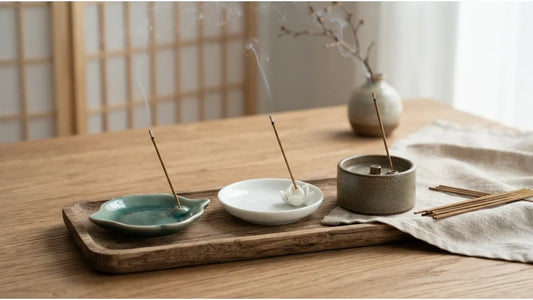 Celadon, porcelain and stoneware ceramic incense holders in a modern minimalist interior