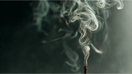 Premium Chinese agarwood incense smoke swirling in a minimalist sanctuary, representing Feng Shui harmony and Qi.