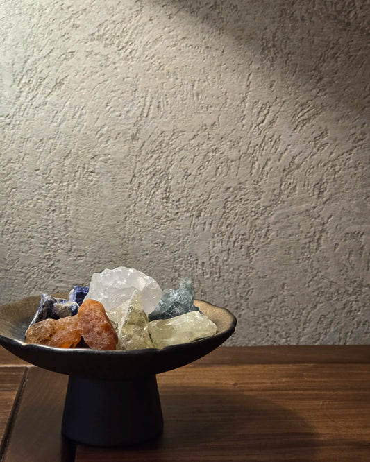 Colorful Five Elements energy stones enhancing feng shui energy flow and meditation focus.