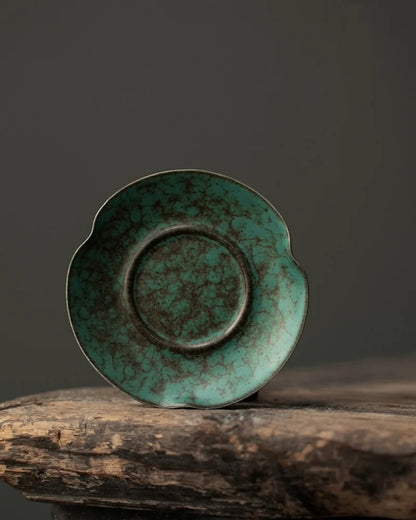 Top view of blue-green reactive glaze ceramic incense holder showing unique high-fired glaze patterns