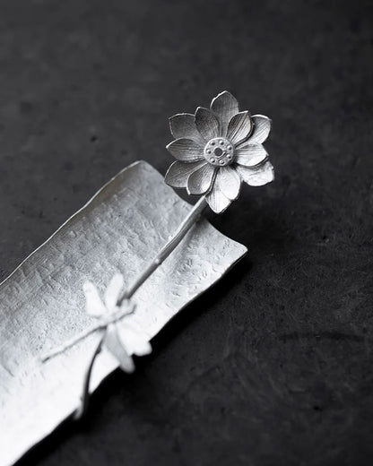 detail of handcrafted lotus incense holder, delicately shaped with layered petals, perfect for meditation and Feng Shui rituals.