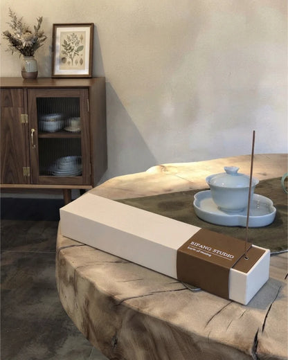 Chinese Five Elements Earth incense in a calm interior for grounding Feng Shui and home scentscaping