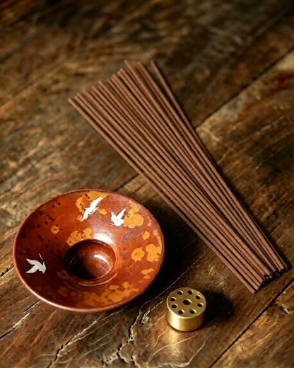 Main product image of Flying Crane ceramic incense holder with chestnut-brown kiln-fired glaze, handmade Chinese incense burner for traditional incense rituals
