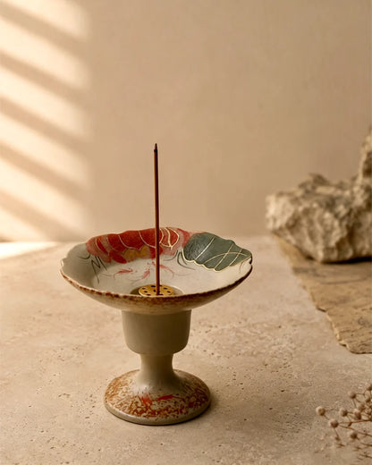 Handmade Chinese incense stick holder featuring lotus artwork, elegant ceramic incense holder for traditional incense rituals